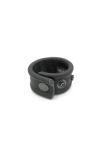 Étire-couilles en cuir avec boutons-pression